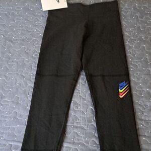 Nike black mid rise tight fit full length leggings size small NWT